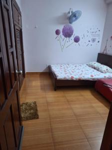 Postel nebo postele na pokoji v ubytování Đại Việt Hoàng