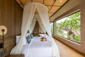 Una cama o camas en una habitación de Irene Resort Koh Lipe 35 fotos más