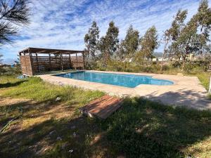 Πισίνα στο ή κοντά στο Cabaña con Piscina Guanaqueros