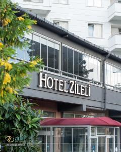 a hotel zillell sign on the side of a building at Zileli Suıtes in Hamidiye +24 photos
