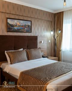 Ένα ή περισσότερα κρεβάτια σε δωμάτιο στο Zileli Suıtes