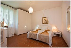 Ένα ή περισσότερα κρεβάτια σε δωμάτιο στο Villa Ariete +23 φωτογραφίες