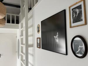 a large flat screen tv hanging on a wall at Boutique stay Mir Lo in Mierlo in Mierlo