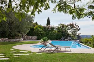 Φωτογραφία από το άλμπουμ του Villa Il Rifugio degli Oleandri - Vista mozzafiato σε Cavaion Veronese