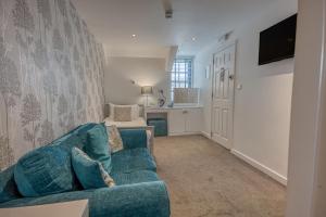 TV a/nebo společenská místnost v ubytování Rose and Crown