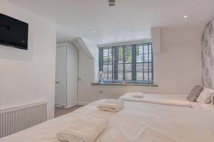 Postel nebo postele na pokoji v ubytování Rose and Crown