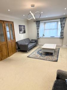 Et opholdsområde på Spacious 4 Bed house in cul-de-sac location