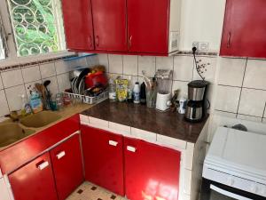 Køkken eller tekøkken på Haut de maison à Deshaies proche de Grande Anse + 44 billeder