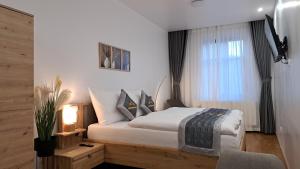 Voodi või voodid majutusasutuse Apartmány Farní toas