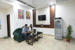 Μια τηλεόραση ή/και κέντρο ψυχαγωγίας στο FabHotel Red Ark Inn