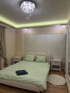 En eller flere senge i et værelse på Amazing Family Delight 2