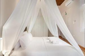 Ένα ή περισσότερα κρεβάτια σε δωμάτιο στο Acropolis 360 Residence,2 bedr