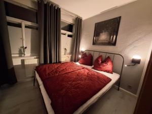 Ένα ή περισσότερα κρεβάτια σε δωμάτιο στο Ferienwohnung im Zschopauer Herzen