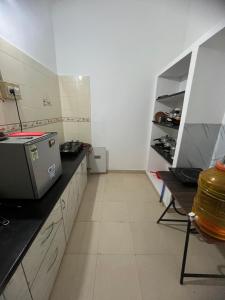 Køkken eller tekøkken på GURI Homestay