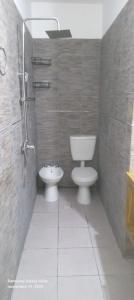 Et badeværelse på Depto 4 personas + 6 billeder