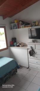 Et tv og/eller underholdning på Depto 4 personas