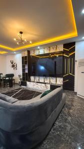 Ένα ή περισσότερα κρεβάτια σε δωμάτιο στο Quantum Havens Apartment - EKO