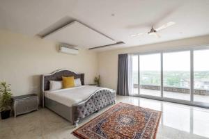 Ένα ή περισσότερα κρεβάτια σε δωμάτιο στο Villa Avanora by DanCenter