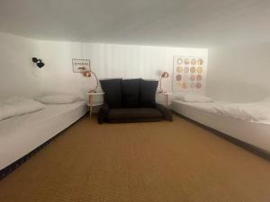 Postel nebo postele na pokoji v ubytování NOIRMOUTIER - Petite maison 500m plage Sableaux