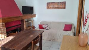 TV a/nebo společenská místnost v ubytování Casa Oliva