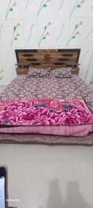 Ένα ή περισσότερα κρεβάτια σε δωμάτιο στο Pawansut Dham