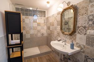 Ένα μπάνιο στο NOI Luxury rooms Colosseum +51 φωτογραφίες