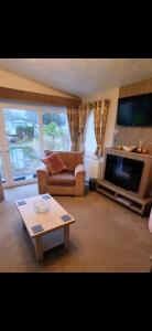 Et tv og/eller underholdning på Wendy's Coastal Haven