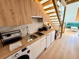 Η κουζίνα ή μικρή κουζίνα στο Premium Plaza San Cristóbal - Gran Vía Centro