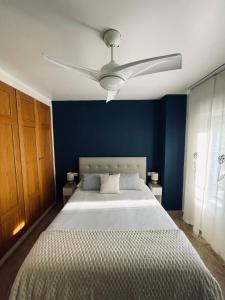 Ένα ή περισσότερα κρεβάτια σε δωμάτιο στο Apartamento La Porteña, 200 ms de playa Victoria