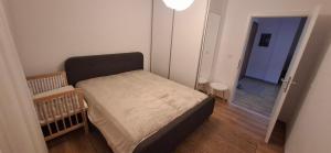 Ένα ή περισσότερα κρεβάτια σε δωμάτιο στο Nice and cozy apartment