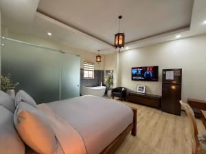 TV/trung tâm giải trí tại Cole Hotel & Apartment