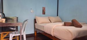 Ένα ή περισσότερα κρεβάτια σε δωμάτιο στο Labelle House