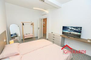 Ένα ή περισσότερα κρεβάτια σε δωμάτιο στο Sara Home