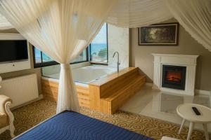 Μια τηλεόραση ή/και κέντρο ψυχαγωγίας στο My Suit Residence & Hotel