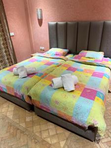 Кровать или кровати в номере Appartement avec rooftop privé 3km des plages Taghazout surf +53 фотографии