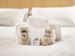 Ένα ή περισσότερα κρεβάτια σε δωμάτιο στο Design Apartment with Private Street Entrance