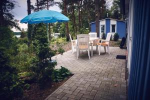 Un jardín fuera de Gemütliches Ferienhaus für bis zu 4 Personen-Urlaub machen, wo der Weihnachtsmann zu Hause ist