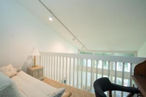 Postel nebo postele na pokoji v ubytování Shady Palms - 2BR Retreat w Pool & Beach Access + 2 fotografie