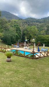 Hồ bơi trong/gần Pousada nas Montanhas de Teresopolis