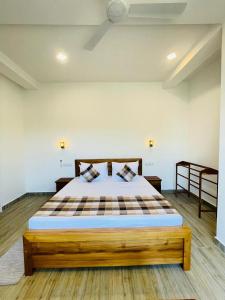 Ένα ή περισσότερα κρεβάτια σε δωμάτιο στο Crossing Royal