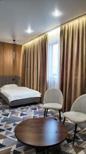 Una cama o camas en una habitación de Irislux