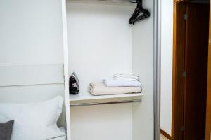 En eller flere senge i et værelse på Life Resort - Temporada