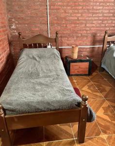 En eller flere senge i et værelse på Anahi