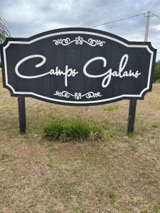 a sign that says camp claus on a field at Campo Galano in Miramar