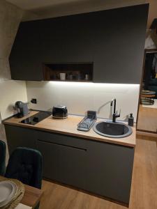 Η κουζίνα ή μικρή κουζίνα στο ZEN Luxury Houses & Spa +35 φωτογραφίες