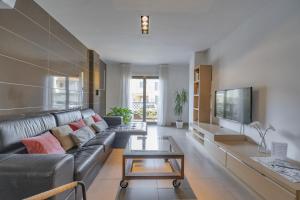 TV a/nebo společenská místnost v ubytování Casa Jimena