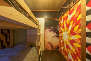 Ένα ή περισσότερα κρεβάτια σε δωμάτιο στο Hoi Hoi