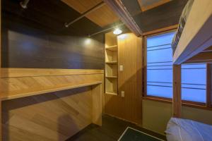 Ένα ή περισσότερα κρεβάτια σε δωμάτιο στο Hoi Hoi +5 φωτογραφίες