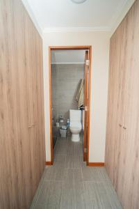 Et badeværelse på Departamento Distrito 1 Cavancha Piso 19