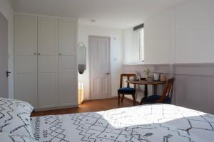 Ένα ή περισσότερα κρεβάτια σε δωμάτιο στο Old Church